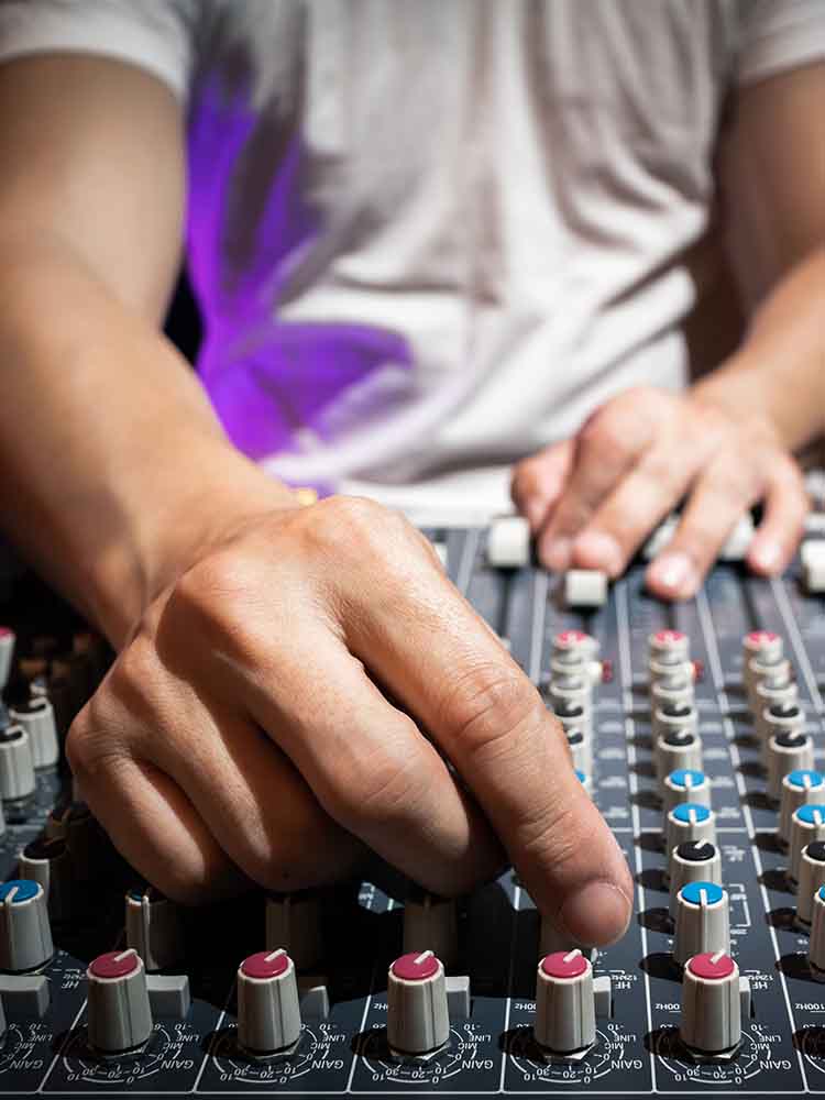 audio engineer on mixer