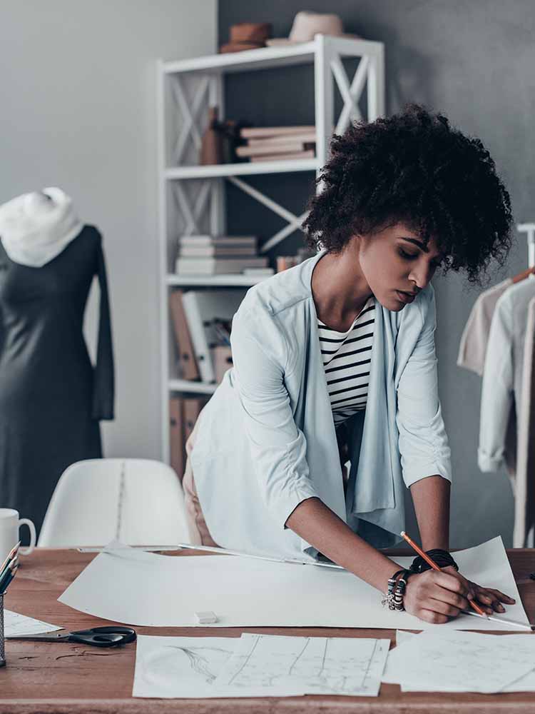 female entrepreneur writing