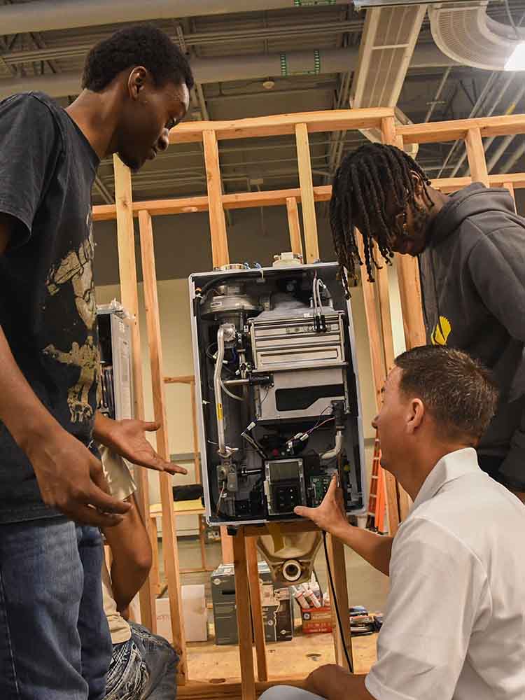 Plumbing Technology Students with Instructor